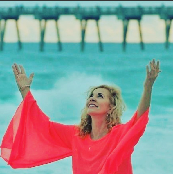 Photo of Roxanne Boudreaux, Lifestyle Clarity Coach by the sea.